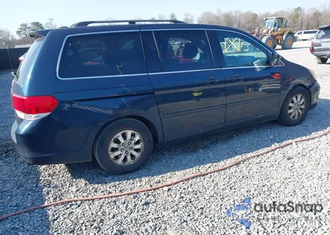 2010 Honda Odyssey Ex-L z USA, uszkodzony, nr VIN 5FNRL3H63AB077151